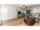 Spacious living room with hardwood floors and a ceiling fan at 2104 Live Oak Dr, Sanford, NC 27330