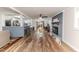 Cozy living room with open floorplan, fireplace, dining table, and kitchen view at 2104 Live Oak Dr, Sanford, NC 27330