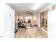 Sunroom with gym equipment, lots of light, and a ceiling fan at 2104 Live Oak Dr, Sanford, NC 27330