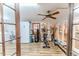 Sunroom with gym equipment, lots of light, and a ceiling fan at 2104 Live Oak Dr, Sanford, NC 27330