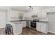 Newly updated kitchen with white cabinets and a stainless steel appliance at 2232 Miller Rd, Hillsborough, NC 27278