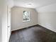 Bedroom with carpet, a bright window, and a classic design for comfort and appeal at 26 Malbry Pl, Durham, NC 27704