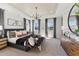 Beautiful bedroom featuring tray ceilings, multiple windows, and ample natural light at 2644 Catheys Creek Cir, Wendell, NC 27591