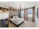 Comfortable bedroom with decorative wall panels and accents of sports themed decor at 2644 Catheys Creek Cir, Wendell, NC 27591