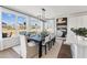 Elegant dining room with modern lighting, stylish decor, and hardwood floors at 2644 Catheys Creek Cir, Wendell, NC 27591