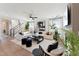 Spacious living room with modern furnishings, fireplace and elegant decor at 2644 Catheys Creek Cir, Wendell, NC 27591