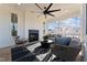 Comfortable screened porch offers modern fireplace and backyard views at 2644 Catheys Creek Cir, Wendell, NC 27591