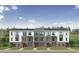 Charming new townhome construction with brick and vinyl siding in a modern design at 2800 Kempthone Rd # 65, Cary, NC 27519