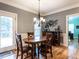 Elegant dining area with wooden table and chairs, perfect for gatherings at 3117 Campbell Rd, Raleigh, NC 27606