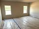 Spacious bedroom with two large windows offering a view, providing plenty of natural light at 316 Olivia Crossing Ct # 11, Four Oaks, NC 27524