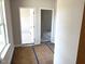 Entryway with two open doorways revealing spacious rooms and natural light at 316 Olivia Crossing Ct # 11, Four Oaks, NC 27524
