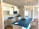 New kitchen with white cabinets, granite countertops, and modern stainless steel appliances at 316 Olivia Crossing Ct # 11, Four Oaks, NC 27524