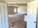 Open living area viewed through French doors with natural light and spacious layout at 316 Olivia Crossing Ct # 11, Four Oaks, NC 27524