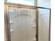 Modern shower stall with glass doors, built-in shelves and recessed lighting at 316 Olivia Crossing Ct # 11, Four Oaks, NC 27524