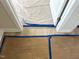 Transition point between carpet and hardwood flooring, showing material and color change at 316 Olivia Crossing Ct # 11, Four Oaks, NC 27524