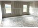 Unfinished room with drywall and windows, presenting a blank canvas for customization at 316 Olivia Crossing Ct # 11, Four Oaks, NC 27524