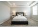 Cozy bedroom featuring recessed lighting, neutral decor, and bedside tables with lamps at 322 Clementine Dr, Cary, NC 27519