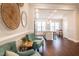 Cozy Breakfast nook features a view of the gourmet kitchen with stainless steel appliances and white cabinetry at 322 Clementine Dr, Cary, NC 27519