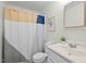 Bathroom featuring a sink and toilet with a colorful shower curtain at 3622 Colchester St # 13, Durham, NC 27707