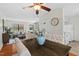 Open concept dining area featuring a modern table with upholstered chairs and seamless access to the kitchen and living room at 3622 Colchester St # 13, Durham, NC 27707