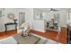 Bright and open living space with hardwood floors and a view of the dining area at 3622 Colchester St # 13, Durham, NC 27707