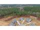 Aerial view of the neighborhood showing home placement within a wooded area at 40 Long Needle Ct, Youngsville, NC 27596