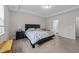 Relaxing primary bedroom showcasing a bed, nightstands, and ensuite bathroom at 40 Long Needle Ct, Youngsville, NC 27596