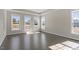 Bright and spacious bedroom featuring ample natural light and wood floors at 4009 Banks Stone Dr, Raleigh, NC 27603