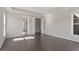 Bright and spacious bedroom featuring ample natural light and wood floors at 4009 Banks Stone Dr, Raleigh, NC 27603