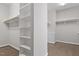 Spacious closet with wooden shelves at 4009 Banks Stone Dr, Raleigh, NC 27603