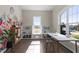 Bright home office with custom built-in shelves, desk and large windows for plenty of natural light at 4009 Banks Stone Dr, Raleigh, NC 27603