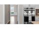 Modern kitchen featuring stainless steel appliances, double oven, and granite countertops at 4009 Banks Stone Dr, Raleigh, NC 27603