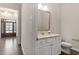 Elegant powder room featuring a marble countertop and stylish fixtures at 4009 Banks Stone Dr, Raleigh, NC 27603