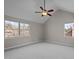 Bright and airy bedroom with vaulted ceilings and two large windows at 4319 White Cliff Ln, Durham, NC 27712