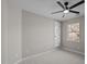 Bedroom featuring neutral walls, carpet, a ceiling fan and a window with a view at 4319 White Cliff Ln, Durham, NC 27712