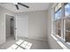 Bedroom featuring a ceiling fan, large window, and a closet at 4319 White Cliff Ln, Durham, NC 27712