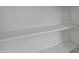 Brightly painted shelving in a closet space offers organized storage solutions in a neutral color at 4319 White Cliff Ln, Durham, NC 27712