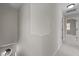 Upstairs hallway featuring fresh, neutral paint and carpet at 4319 White Cliff Ln, Durham, NC 27712