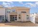 A backyard view featuring a screen porch and a well-maintained lawn at 501 Historic Dr, Hillsborough, NC 27278
