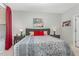 Comfortable bedroom features a queen bed, two nightstands, and decorative wall art for a warm and inviting atmosphere at 501 Historic Dr, Hillsborough, NC 27278