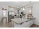 Spacious kitchen boasts stainless steel appliances, granite countertops, and ample cabinet space at 501 Historic Dr, Hillsborough, NC 27278