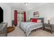 Comfortable bedroom with neutral colors, a large window, and ample space at 501 Historic Dr, Hillsborough, NC 27278