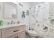 Bathroom with a stylish vanity and decorative shower curtain at 506 W Gilbreath St, Graham, NC 27253