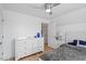 Comfortable bedroom featuring a dresser and a serene atmosphere at 506 W Gilbreath St, Graham, NC 27253