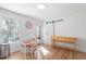 Bright dining area with table and chairs, and a view to the backyard at 506 W Gilbreath St, Graham, NC 27253
