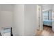 Hallway leading to a bedroom with a view from the staircase at 506 W Gilbreath St, Graham, NC 27253
