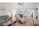 Inviting living room with hardwood floors and lots of natural light at 506 W Gilbreath St, Graham, NC 27253