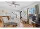 Inviting living room with hardwood floors and lots of natural light at 506 W Gilbreath St, Graham, NC 27253