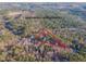 Aerial view of property with estimated line and feet, showcasing the home's setting among trees at 5171 S River Rd, Lillington, NC 27546