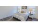 Comfortable bedroom with soft lighting, neutral tones, and simple decor, offering a peaceful retreat at 5171 S River Rd, Lillington, NC 27546